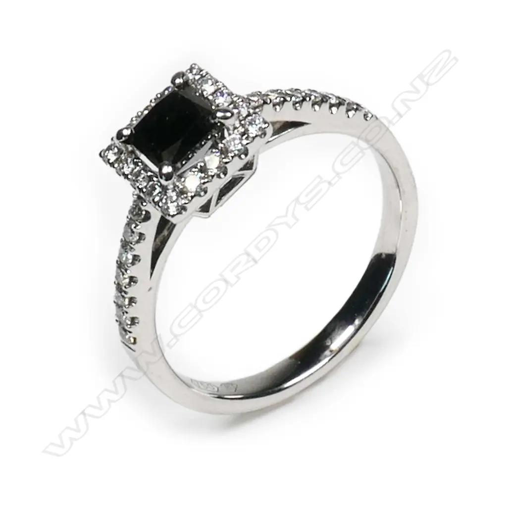 An 18ct white gold and diamond cluster ring, Image 1++