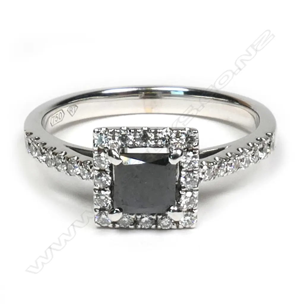 An 18ct white gold and diamond cluster ring, Image 1++