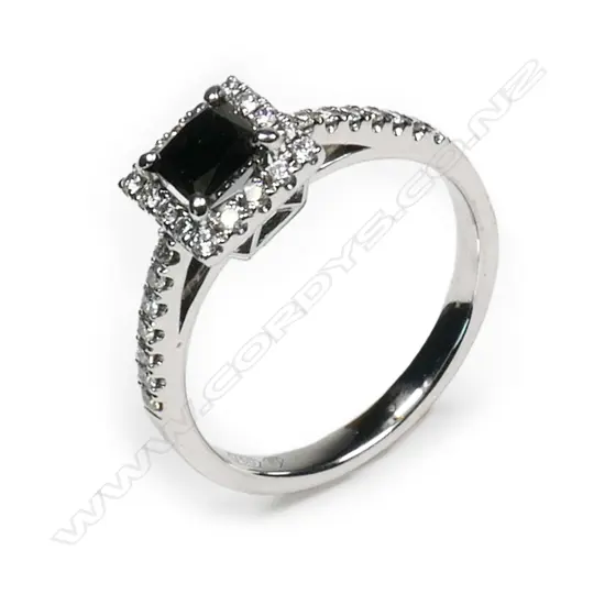 An 18ct white gold and diamond cluster ring,