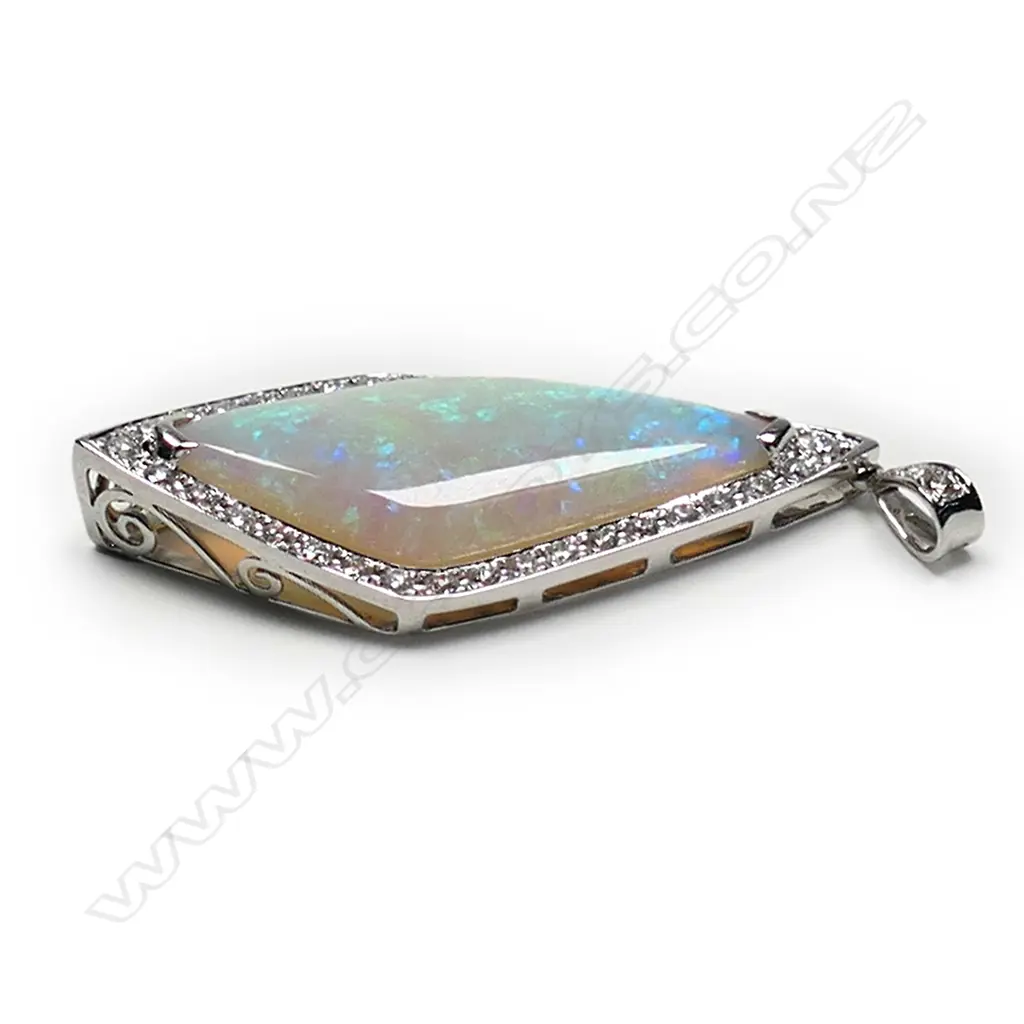 A 14ct white gold, opal and diamond drop pendant, Image 1++