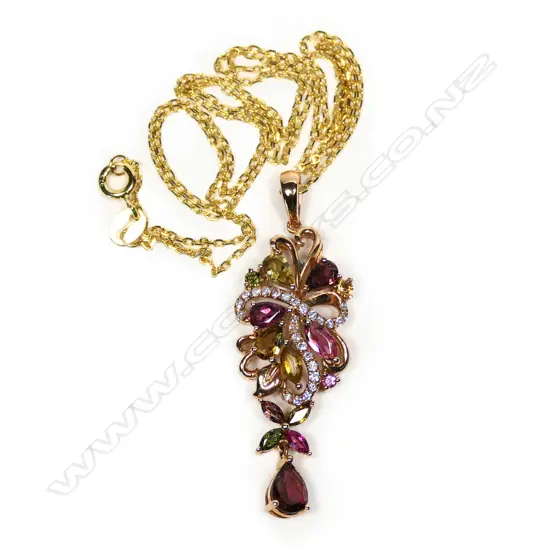An 18ct rose gold, diamond and tourmaline pendant on chain,