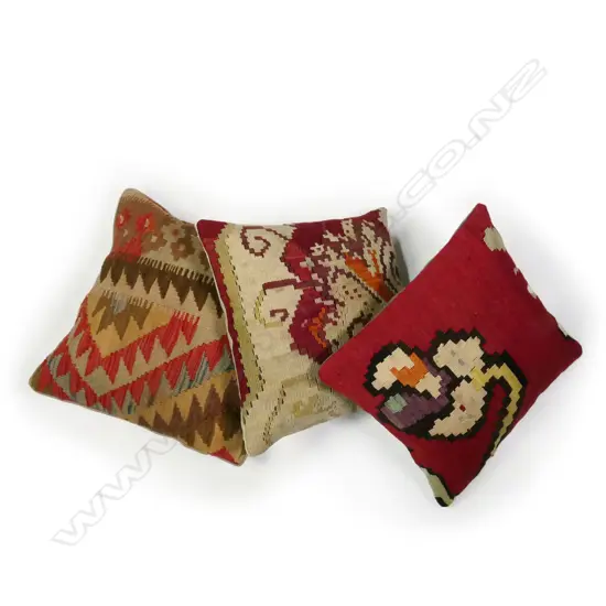Three scatter cushions with slit weft kilim faces,