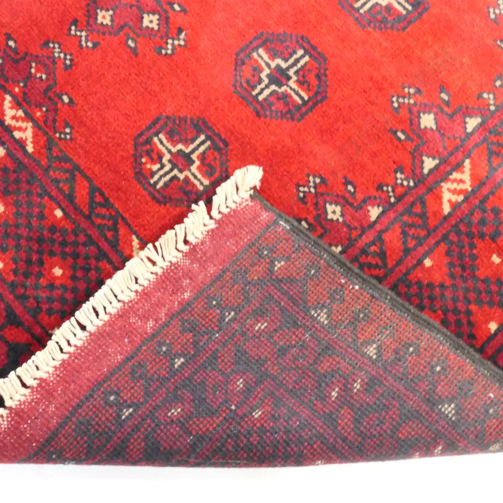 A hand knotted Afghan Turkman rug, Image 1++