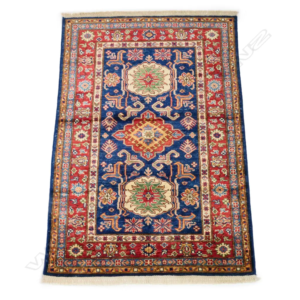A tribal Kazak rug, hand knotted wool pile, Image 1++