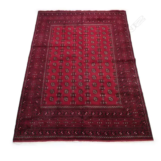 A hand knotted Turkman carpet,