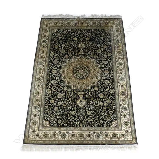 A finely hand knotted Qum silk pile carpet,