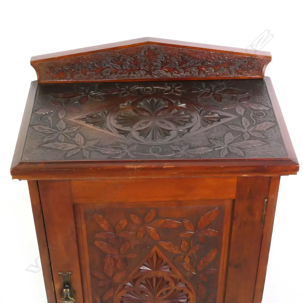 An early NZ kauri chipped carved music cabinet, Image 1++