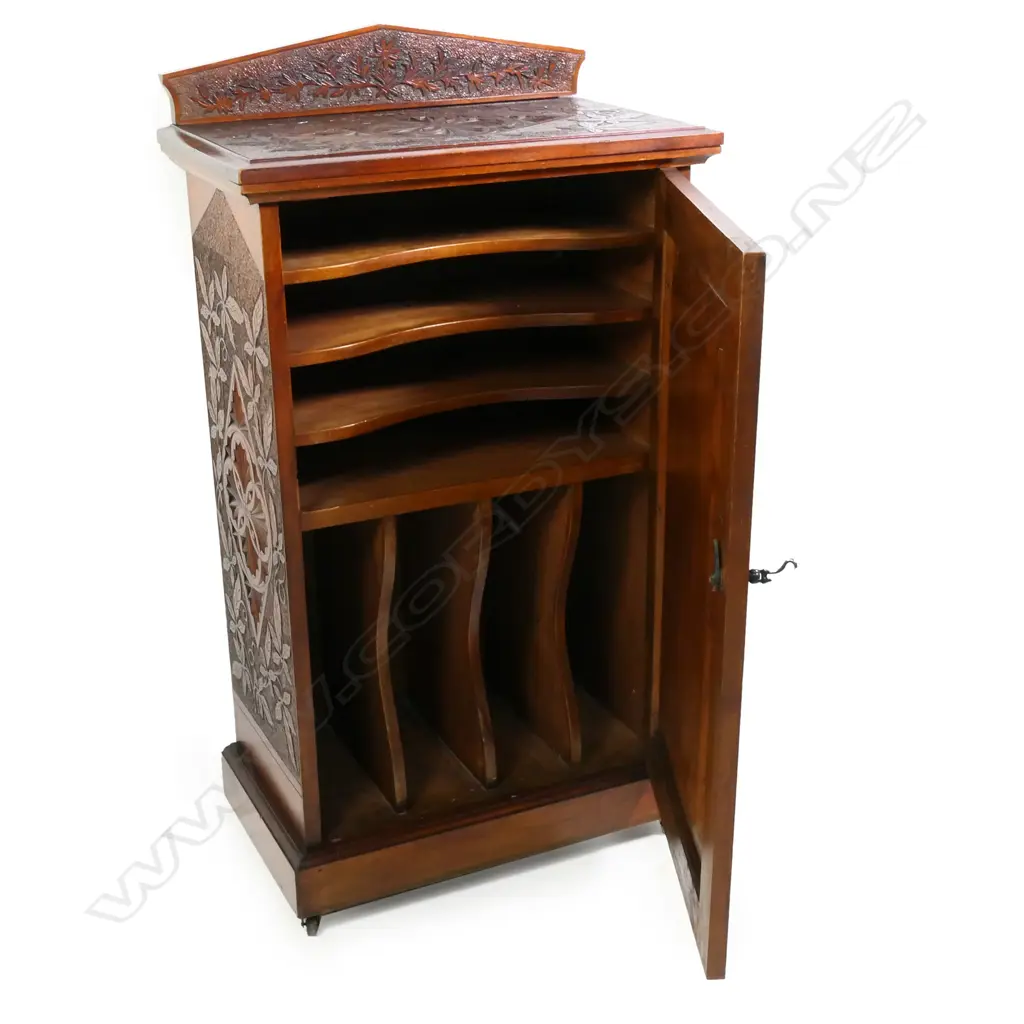 An early NZ kauri chipped carved music cabinet, Image 1++