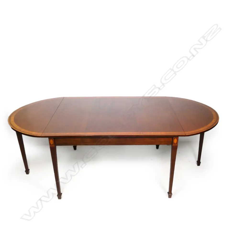 A Sheraton style mahogany drop leaf demi-lune ended dining table, Image 1++