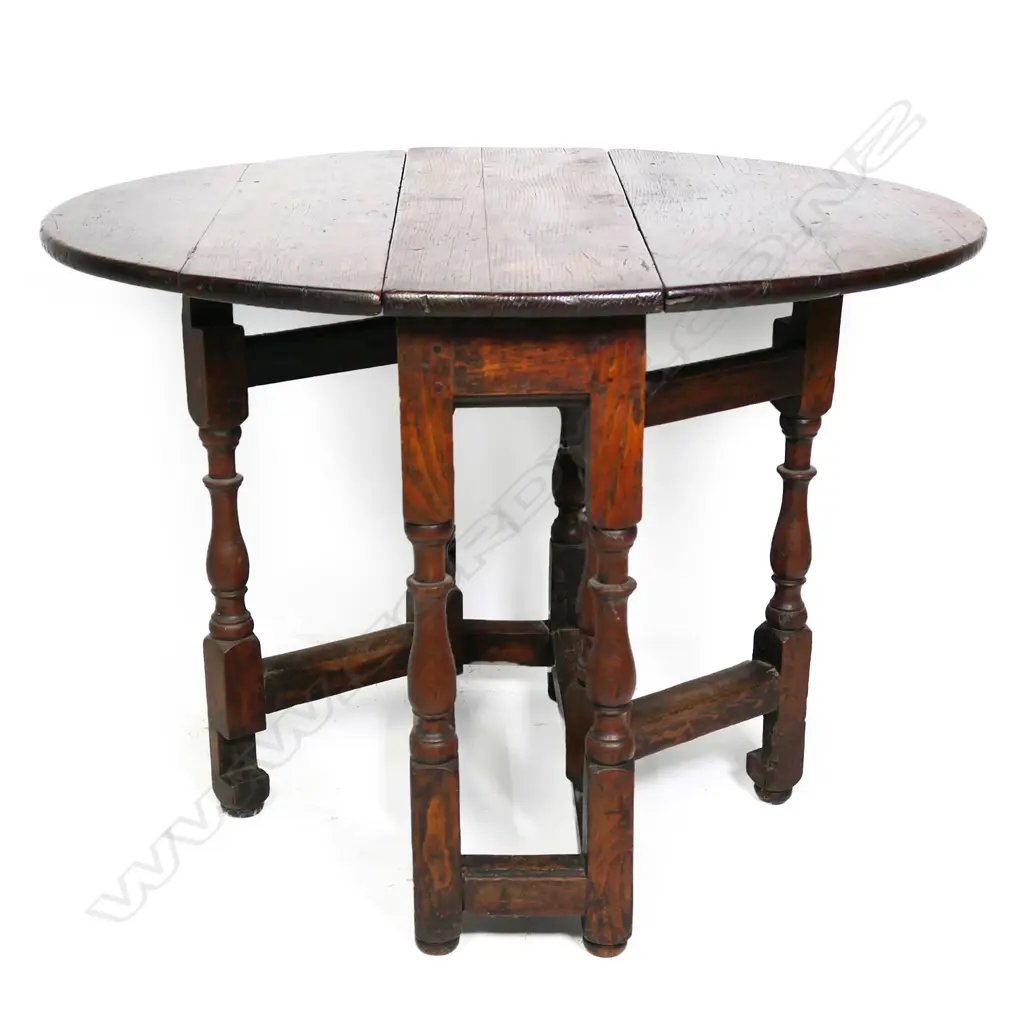A Georgian oak gate leg table, Image 1++