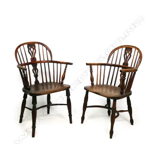 A pair of 19thC elm low back Windsor chairs,