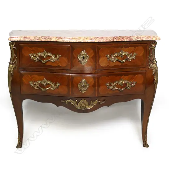 A quality antique style French bombe commode,