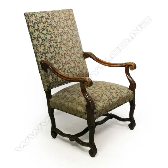 A French baronial style open elbow armchair,