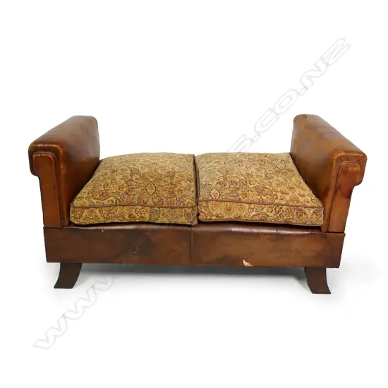 A two-seater, 1930s leather upholstered club-style day bed,