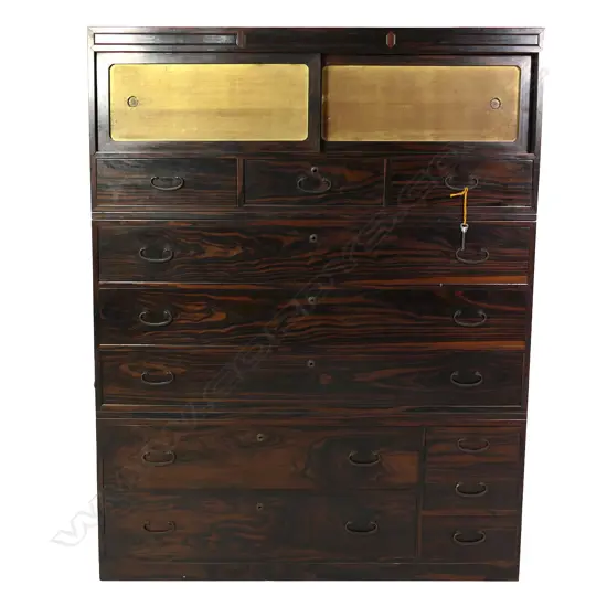 An early 20thC Japanese Taisho period ebony fronted kimono chest,