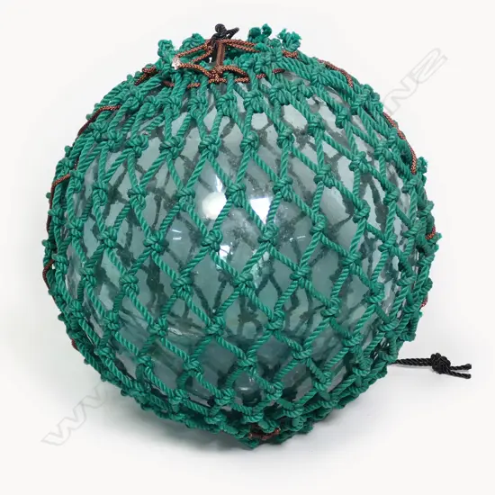 An old Japanese glass fishing float,