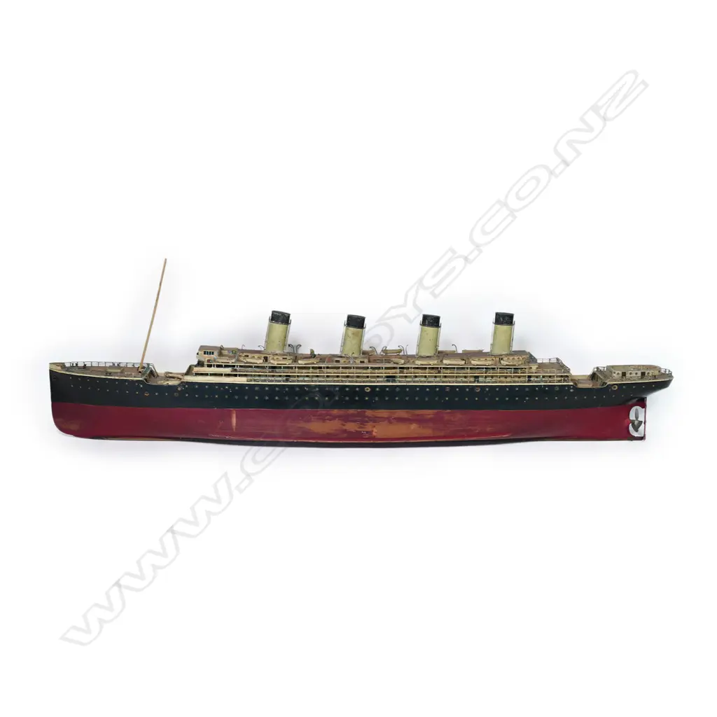A scratch-built model of a four-funnel ocean liner Image 1++