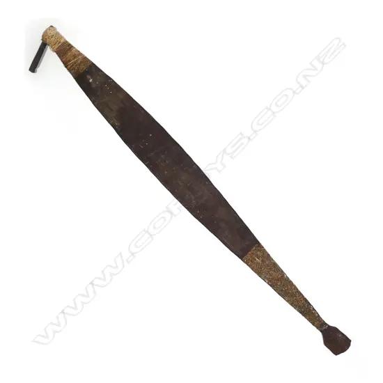 An old Aboriginal woomera (spear thrower),