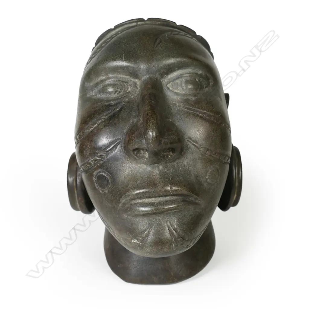 A Solomon Islands carved stone head, Image 1++