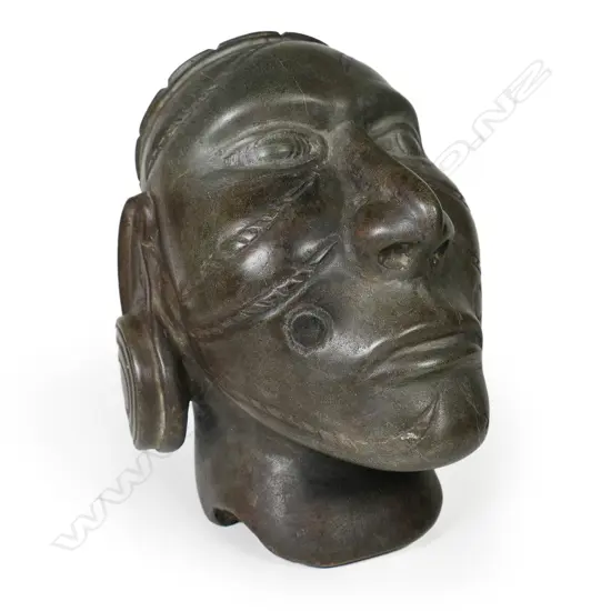 A Solomon Islands carved stone head,