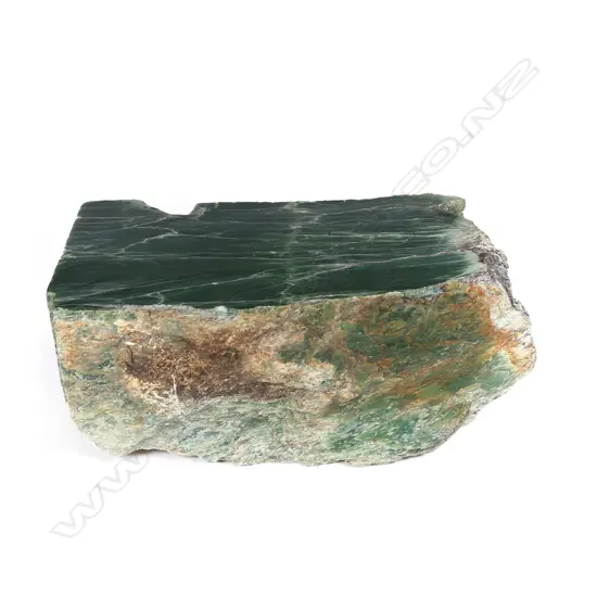 A large natural and cut block of nephrite pounamu,