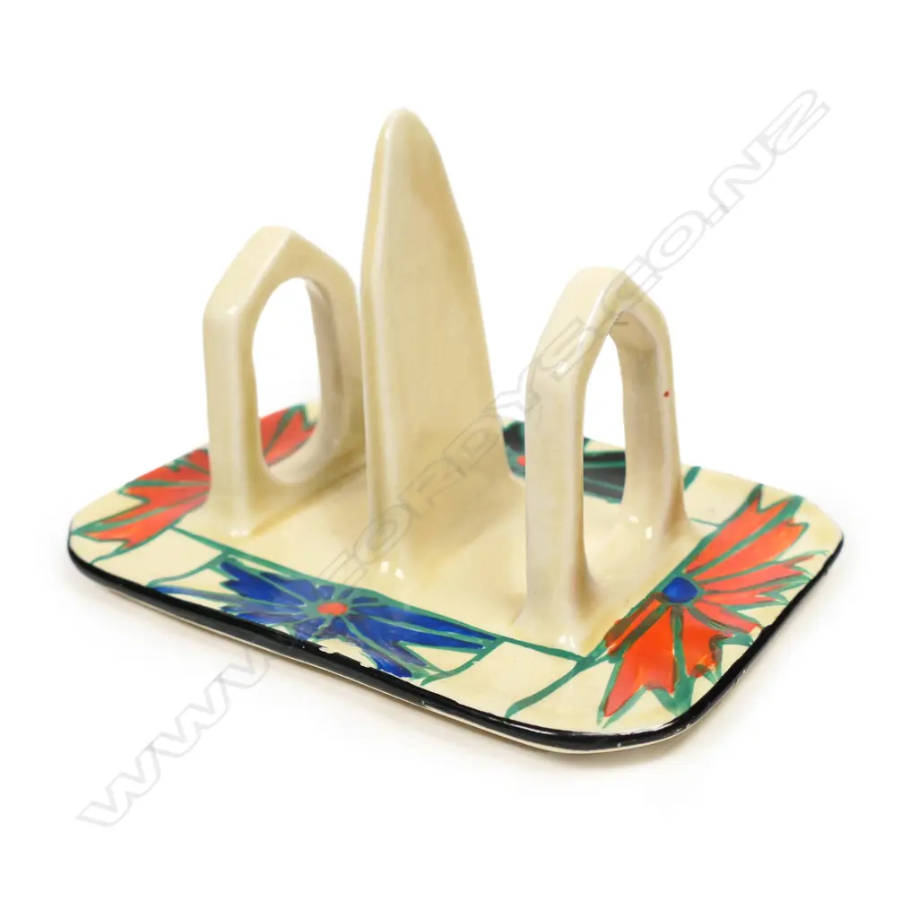 A Clarice Cliff Fantasque Red Umbrella toast rack, Image 1++
