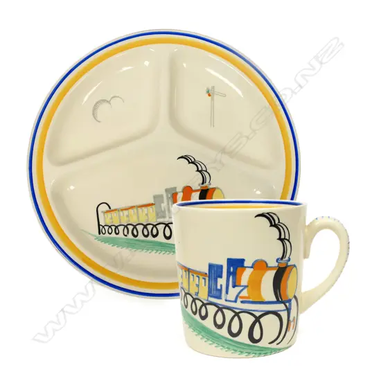 An Art Deco Susie Cooper Nursery Ware "Train" pattern plate and mug