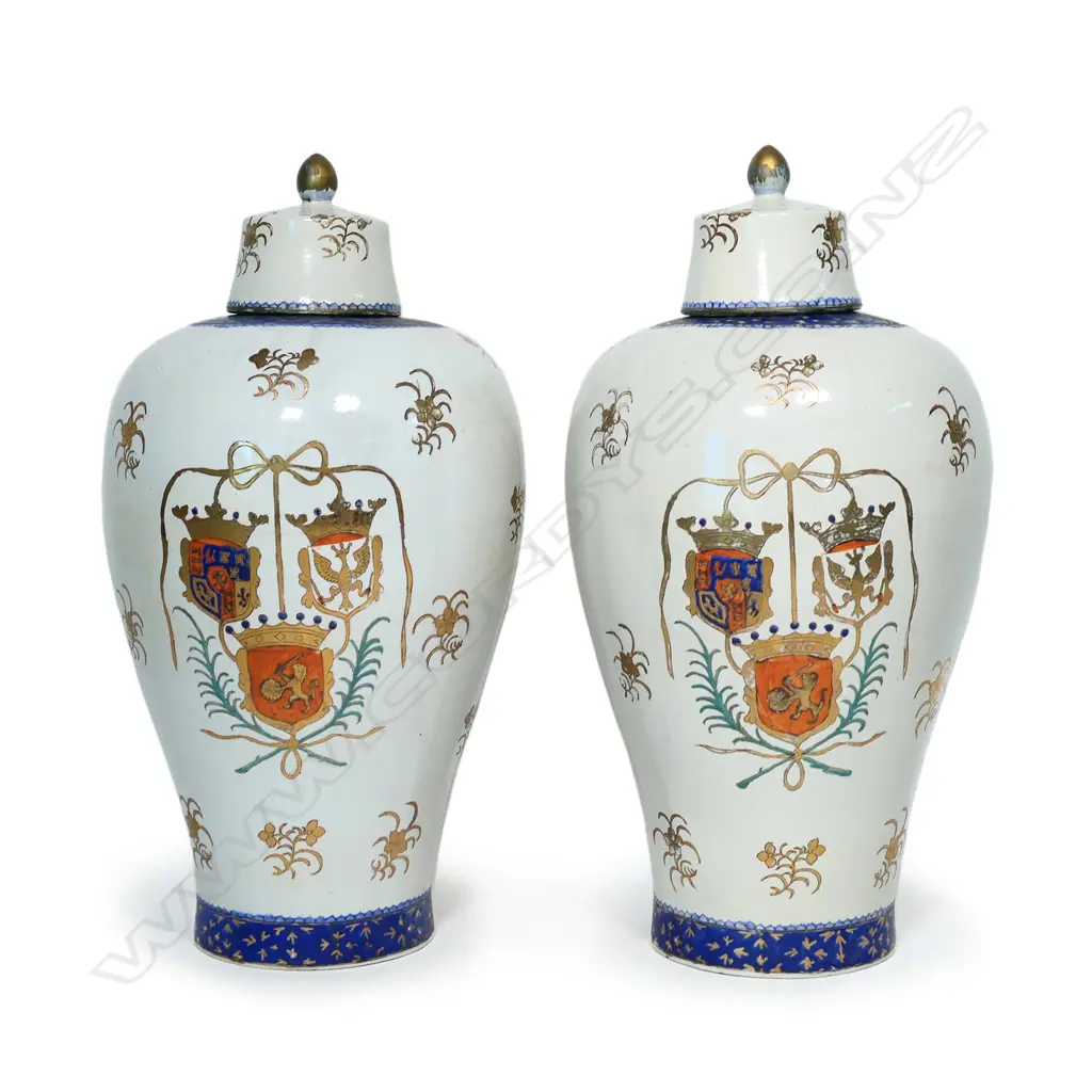 A pair of decorative armorial lidded jars Image 1++