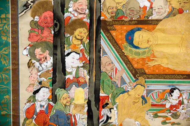 A Japanese, Edo period hanging scroll painting  Nehan-zu, (the death of the Buddha) a depiction the parinirvana, or entry into a state of  complete enlightenment, of  the Buddha Sakyamuni. Executed on finely woven textile, most likely silk, with a backing of heavy paper. Image 1++