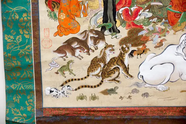 A Japanese, Edo period hanging scroll painting  Nehan-zu, (the death of the Buddha) a depiction the parinirvana, or entry into a state of  complete enlightenment, of  the Buddha Sakyamuni. Executed on finely woven textile, most likely silk, with a backing of heavy paper. Image 1++