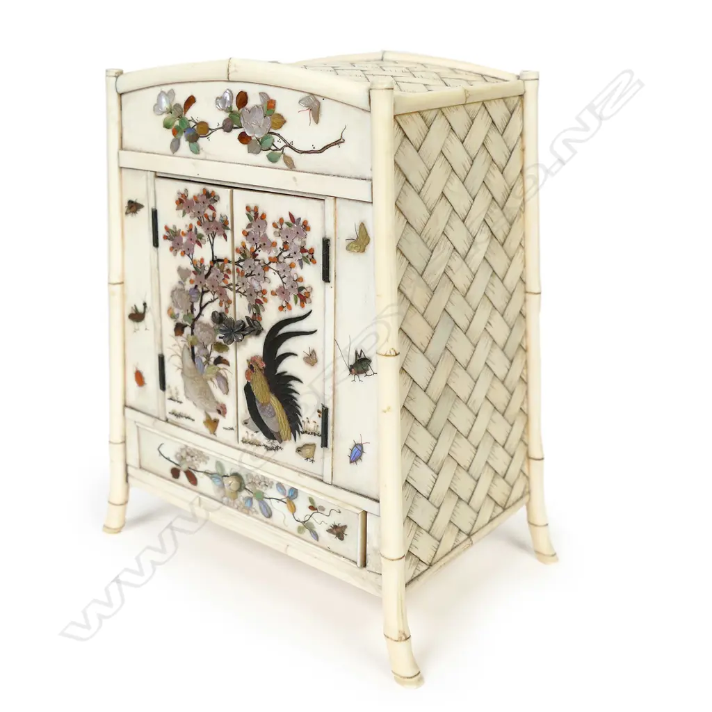 A Japanese late Meiji period ivory miniature cabinet, Image 1++