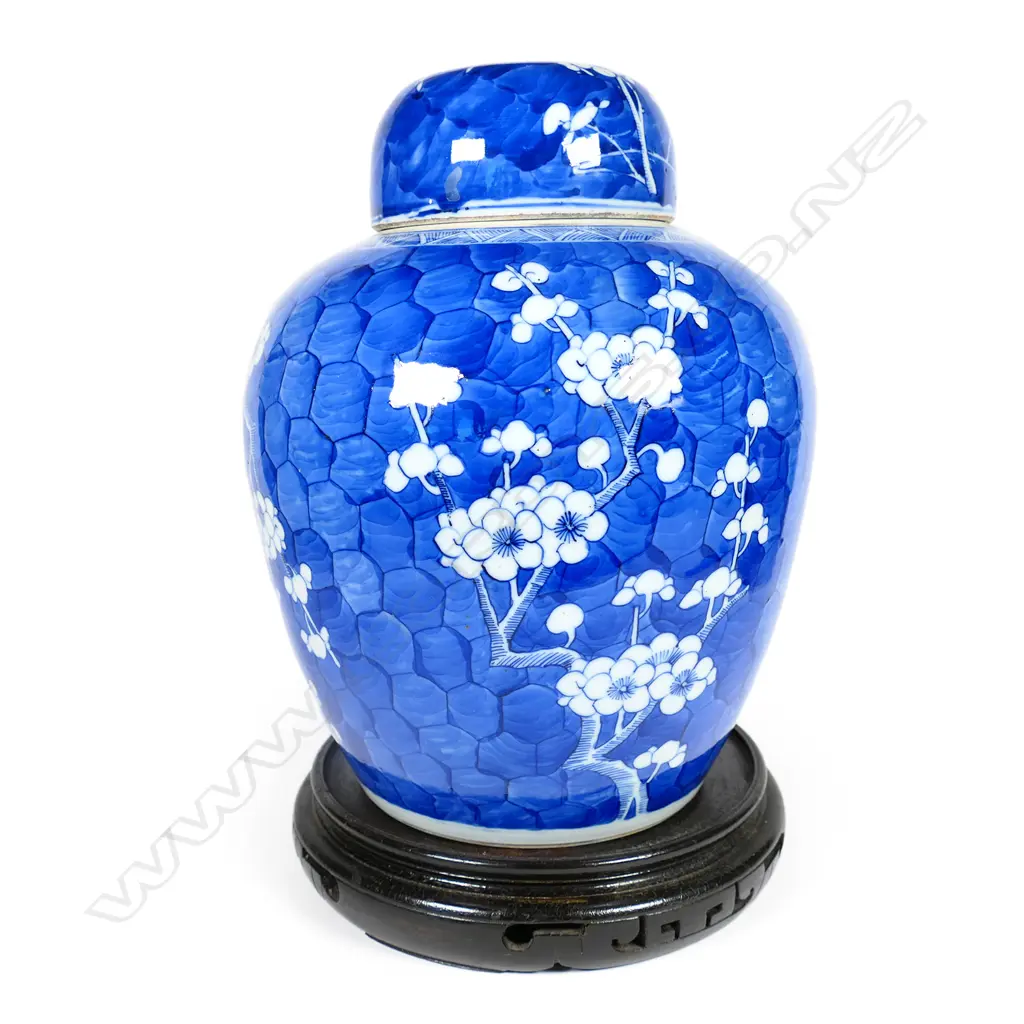 A large 19thC Chinese porcelain ginger jar on wooden stand Image 1++