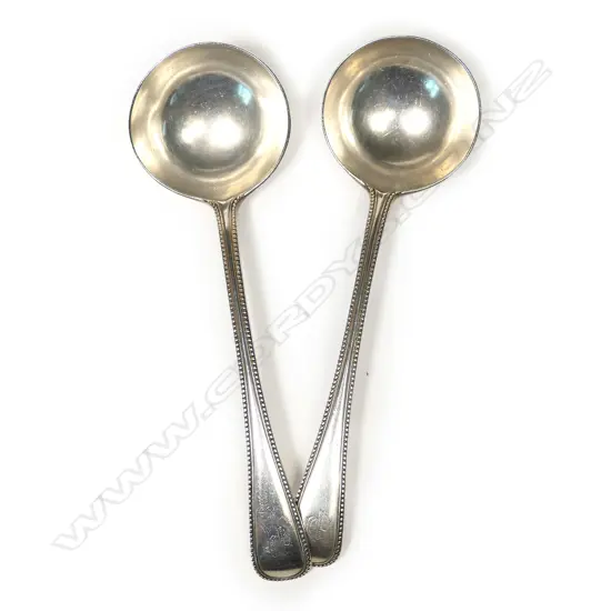 A pair of Victorian silver sauce ladles