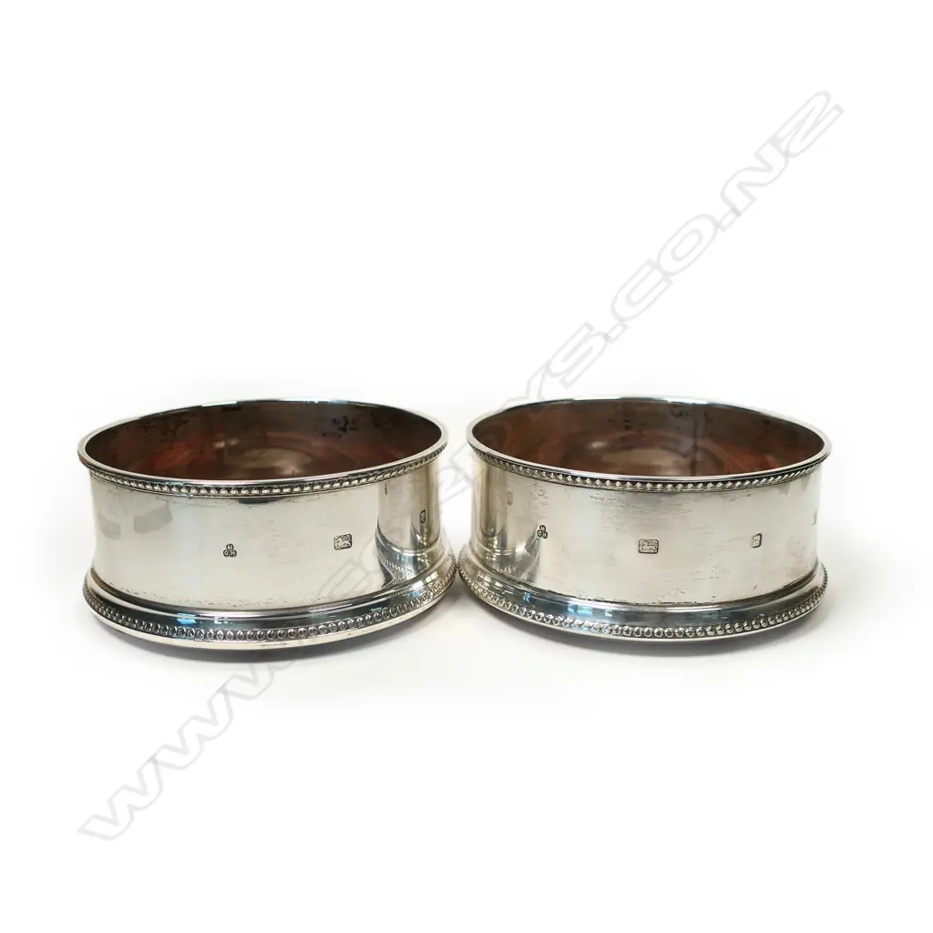A pair of contemporary silver bottle coasters, Image 1++