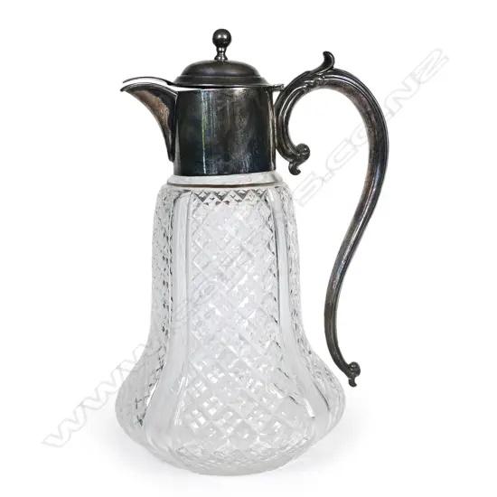 A late Victorian silver and crystal claret jug,