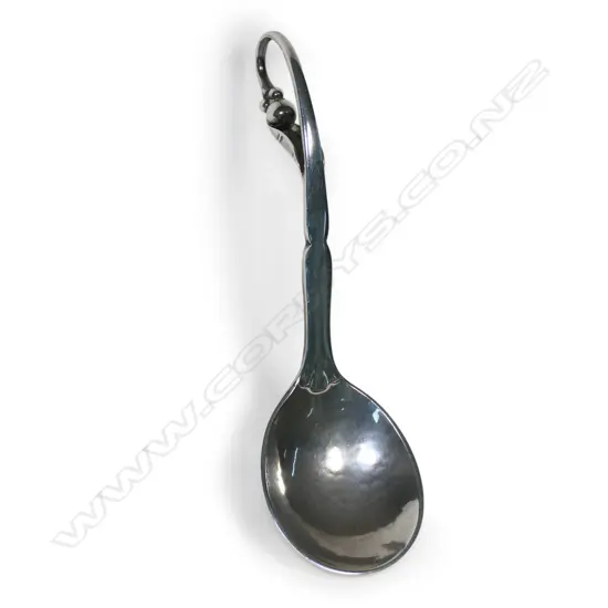 A Georg Jensen silver caddy or condiment spoon