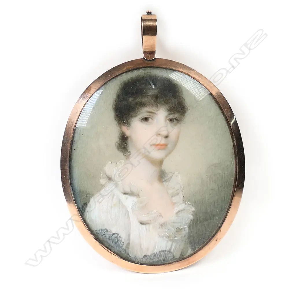 A 19thC 9ct gold framed painted portrait miniature of a young woman, Image 1++