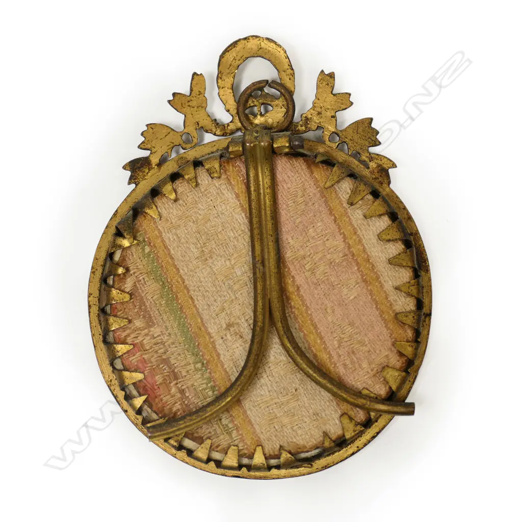 A portrait miniature painted on ivory of a woman in Belle Époque dress Image 1++