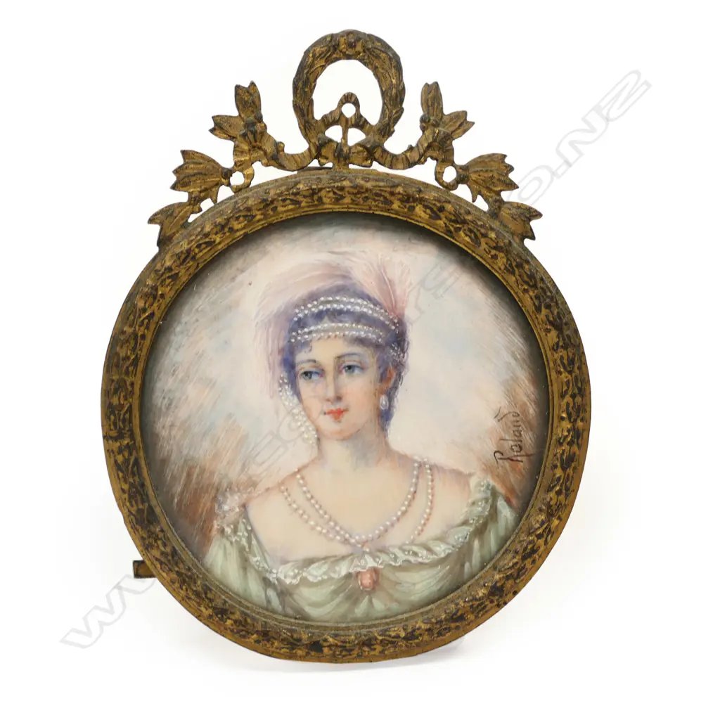 A portrait miniature painted on ivory of a woman in Belle Époque dress Image 1++