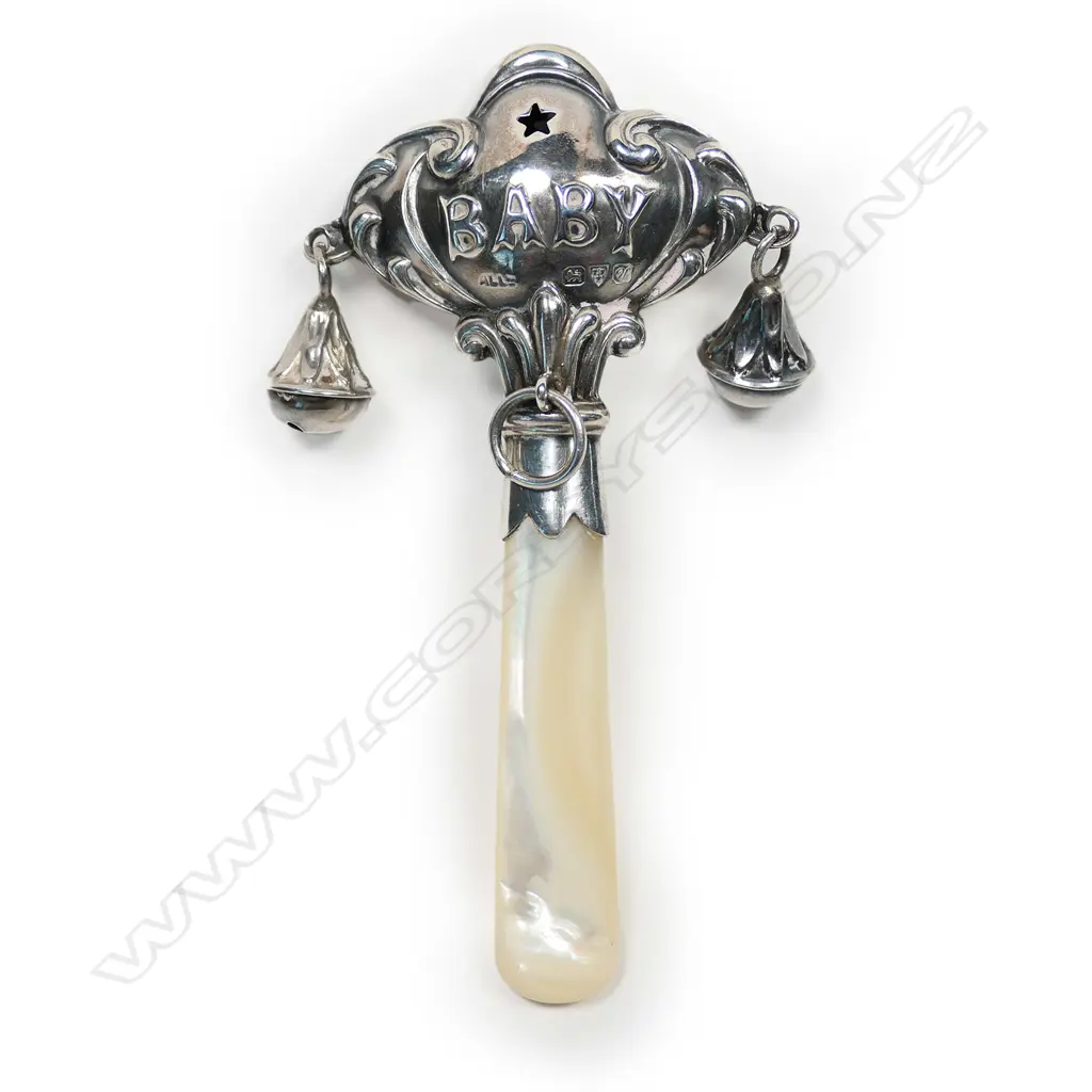 An early 1900s silver and mother of pearl baby rattle, Image 1++