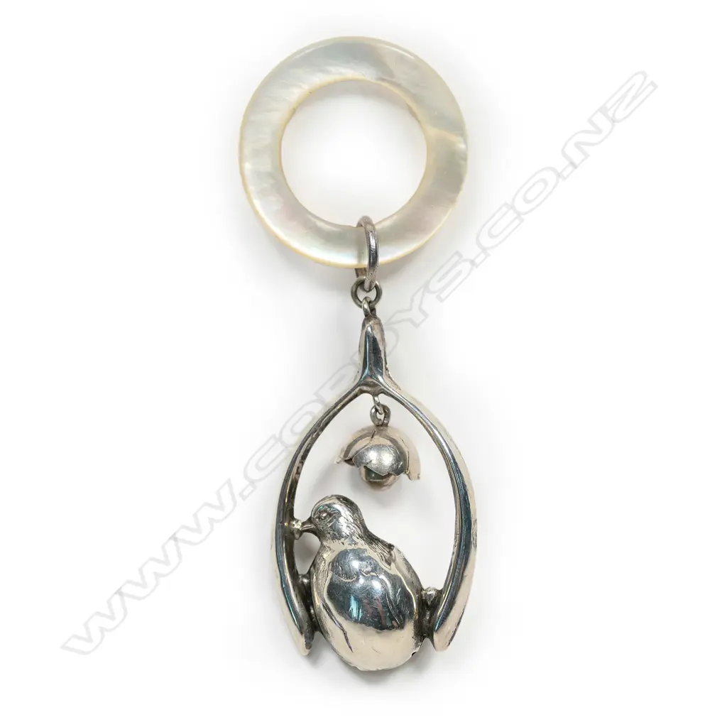 An early 1900s silver and mother of pearl baby rattle, Image 1++