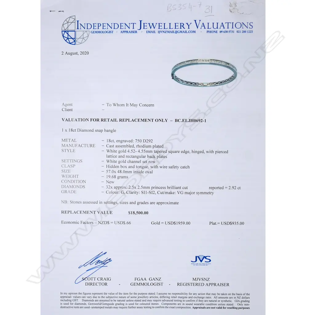 An 18ct white gold and diamond bangle, Image 1++