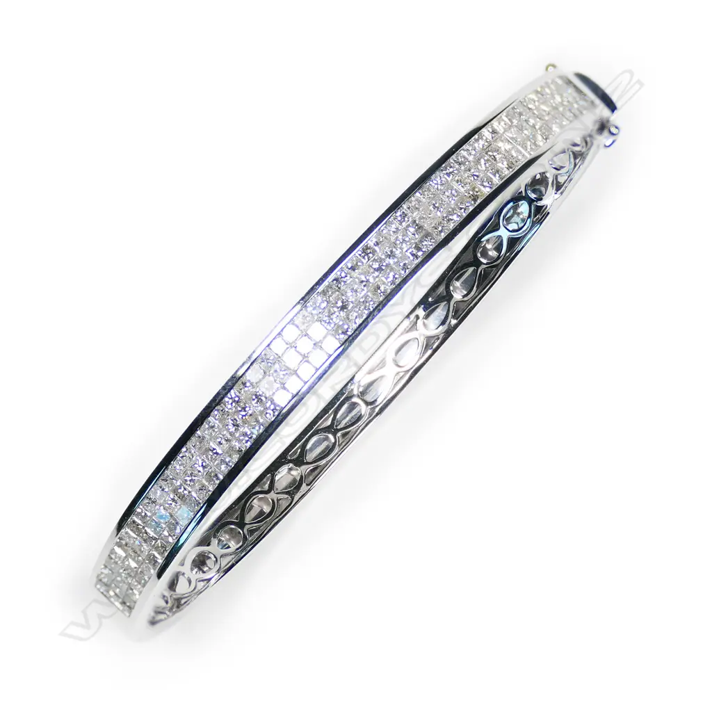 A modern 9ct white gold and diamond hinged bangle, Image 1++