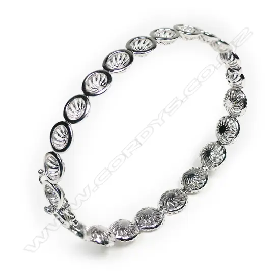 An 18ct gold and diamond hinged bangle,