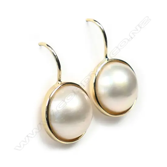 A pair of 14ct gold retro style Mabe pearl earrings,