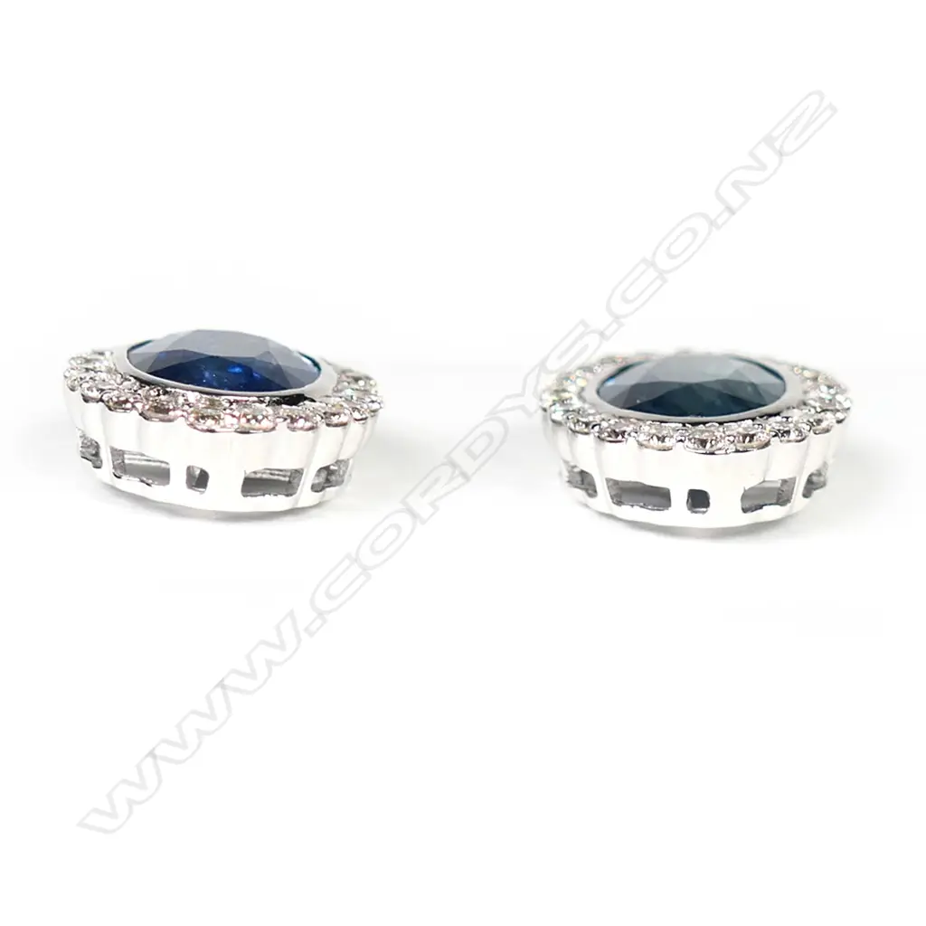 A pair of 14ct white gold, sapphire and diamond halo earrings, Image 1++