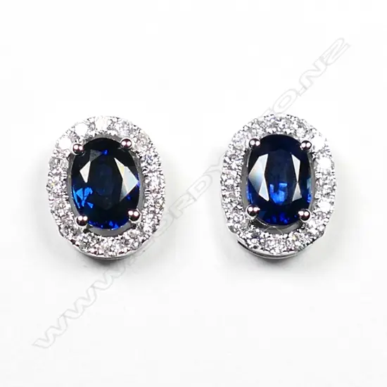 A pair of 18ct white gold, sapphire and diamond earrings,