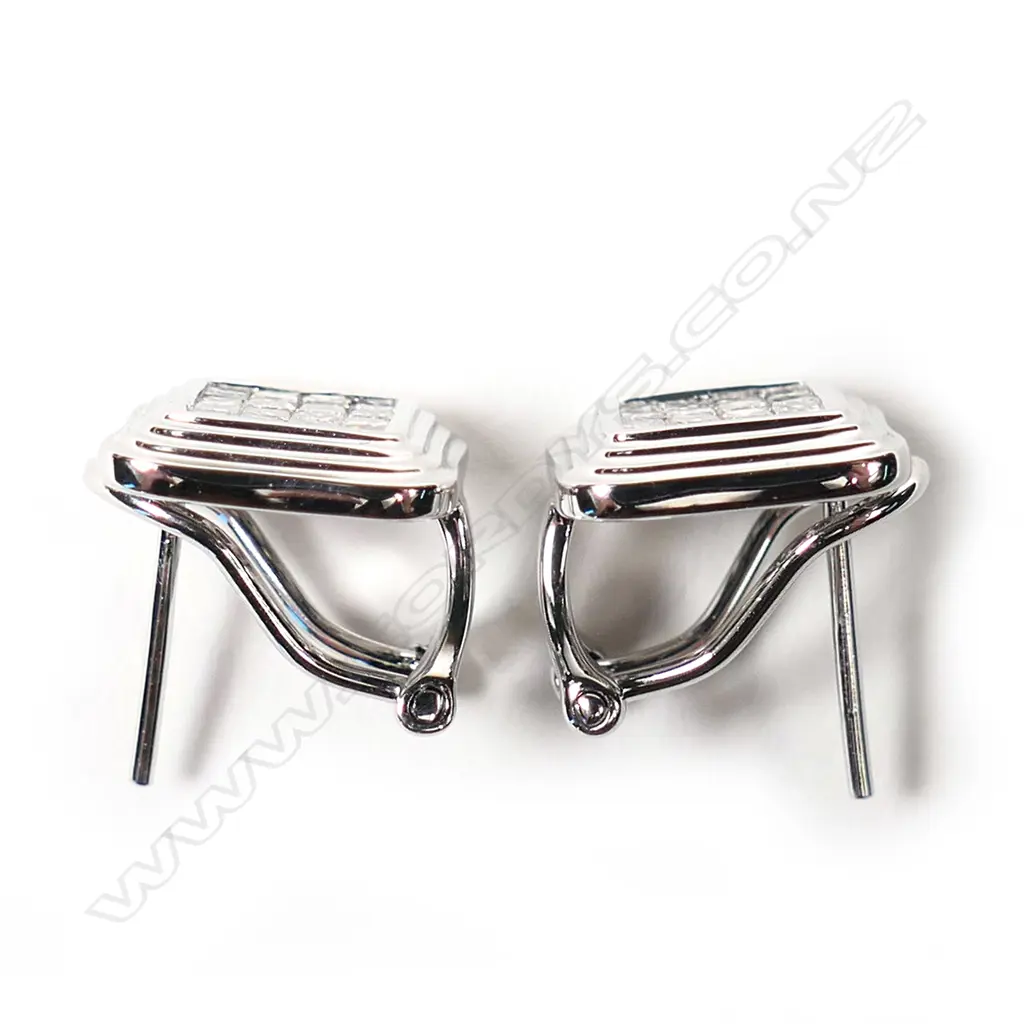 A pair of 18ct white gold and diamond earrings, Image 1++