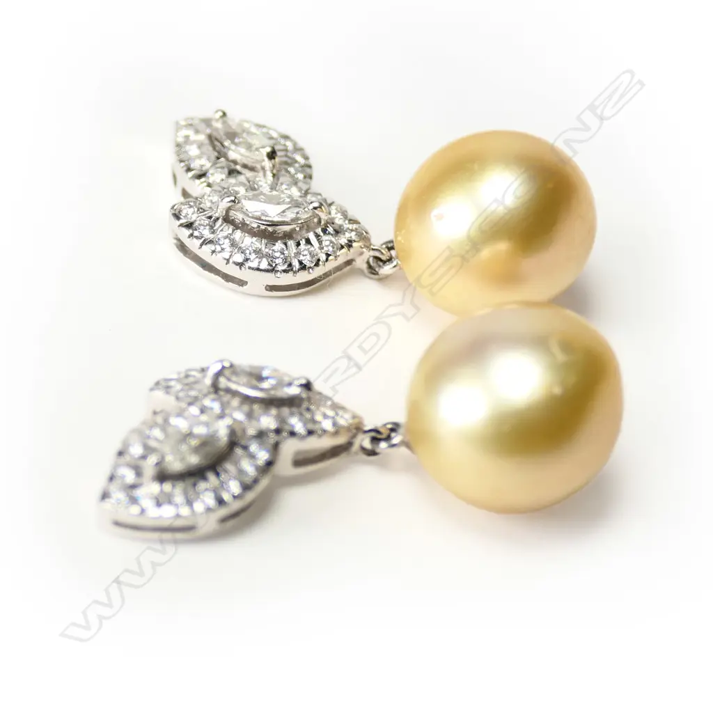 A pair of 18ct white gold, pearl and diamond earrings, Image 1++