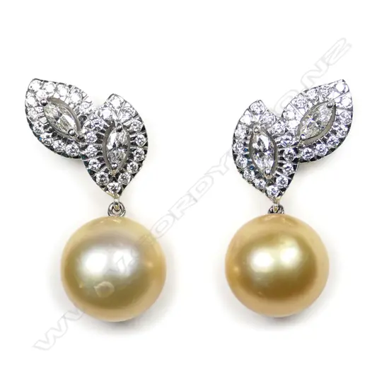 A pair of 18ct white gold, pearl and diamond earrings,